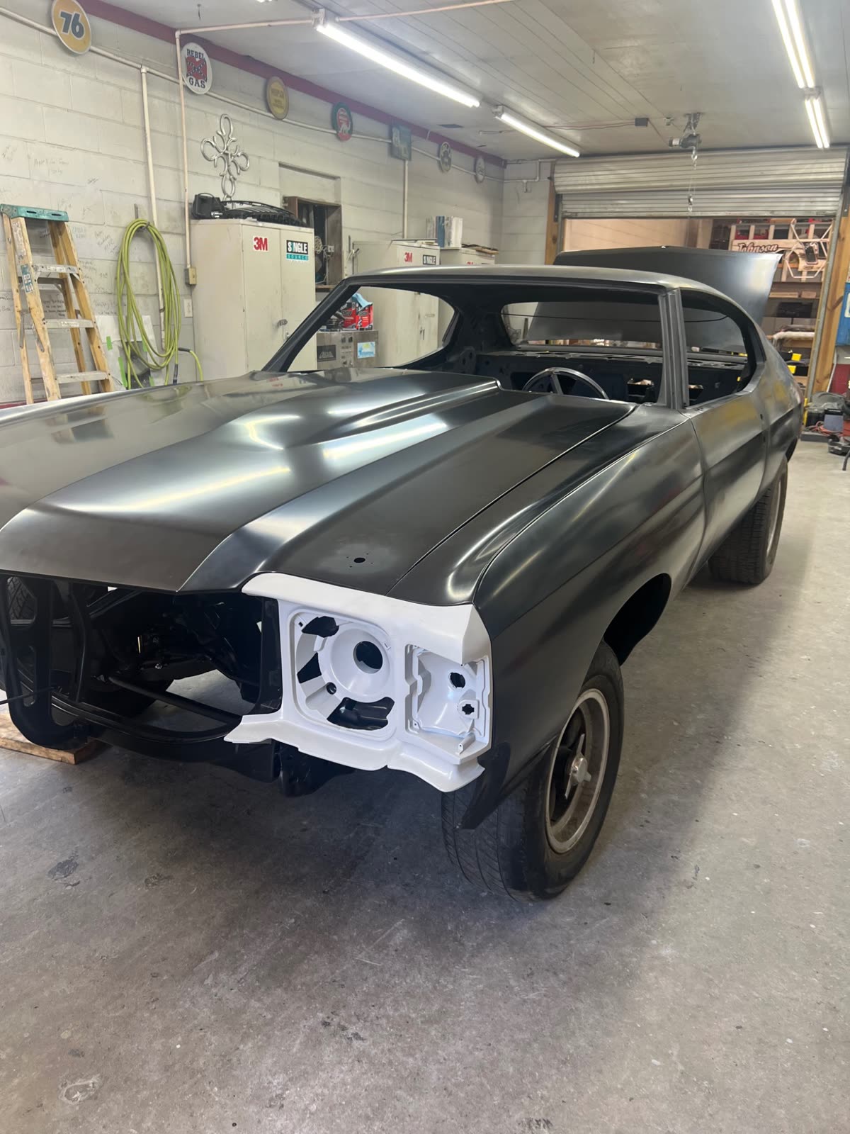 Chevrolet Chevelle restoration in progress with fresh paint